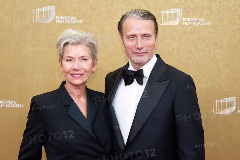 Mads Mikkelsen with woman Hanne Jacobsen, EUROPEAN FILM AWARDS Berlin 2026, photo call at the House of World Cultures, Berlin, 17.01.2026