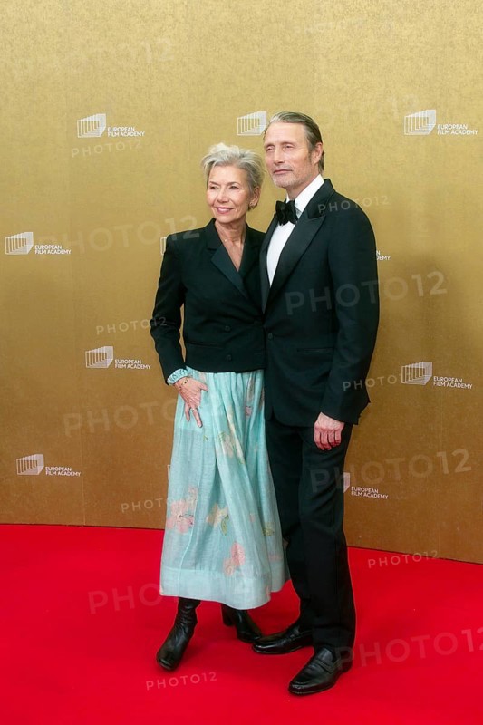 Mads Mikkelsen with woman Hanne Jacobsen, EUROPEAN FILM AWARDS Berlin 2026, photo call at the House of World Cultures, Berlin, 17.01.2026