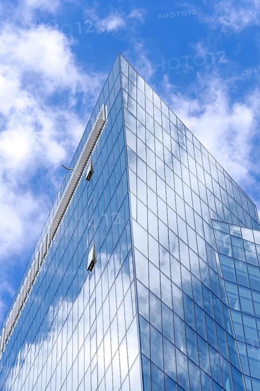 Skyscraper, high-rise office building with sky reflected in mirrored glass panes, Vilnius Central Business District, CBD in Šnipišk? s, Lithuania