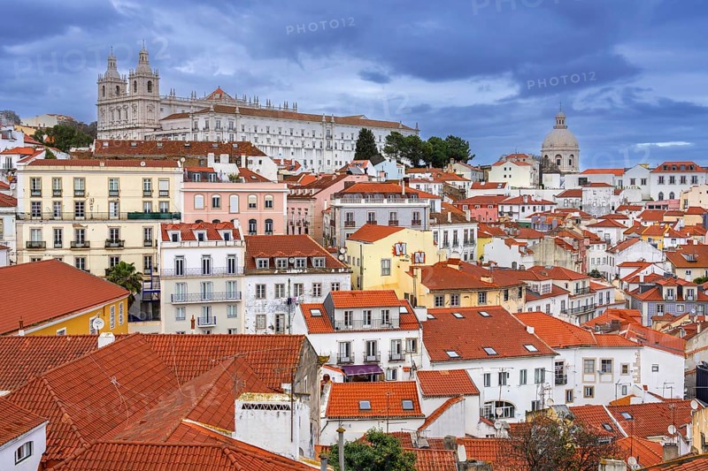 View over rooftops, apartments, monastery with church and the National Pantheon in Alfama, oldest neighborhood in the city Lisbon, Lisboa, Portugal