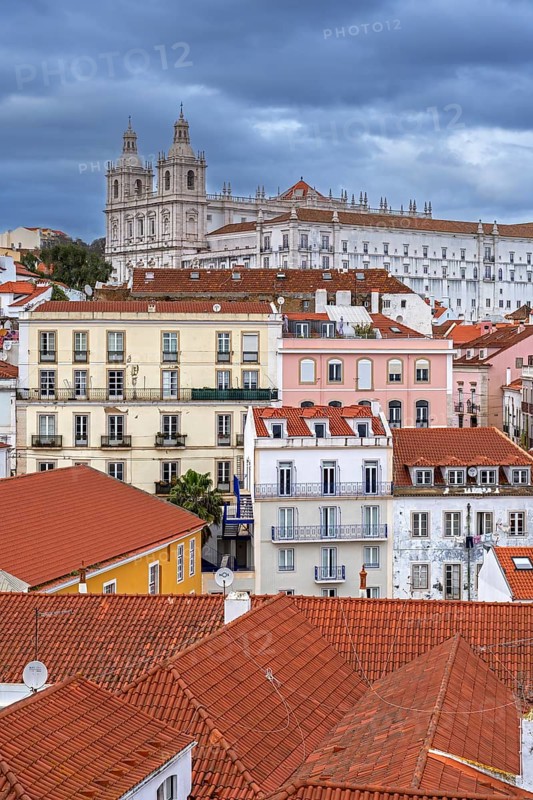 View over rooftops, flats and the Church and Monastery of São Vicente de Fora in Alfama, oldest neighborhood in the city Lisbon, Lisboa, Portugal