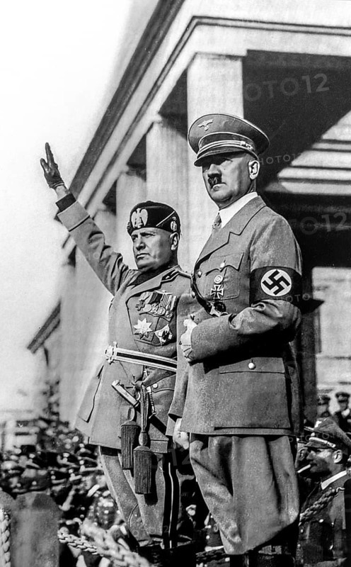 Black and white archival photograph showing dictator Benito Mussolini, leader of fascist Italy and Adolf Hitler, dictator of Nazi Germany