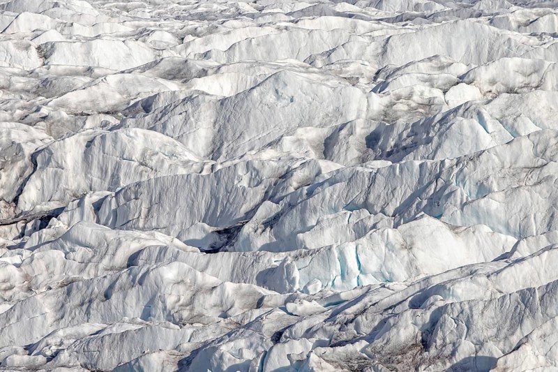 Aerial view over Monacobreen, glacier in Haakon VII Land which debouches into Liefdefjorden, Spitsbergen, Svalbard, Norway