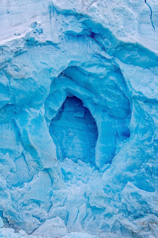 Blue ice wall of Monacobreen, glacier in Haakon VII Land which debouches into Liefdefjorden, Spitsbergen, Svalbard, Norway