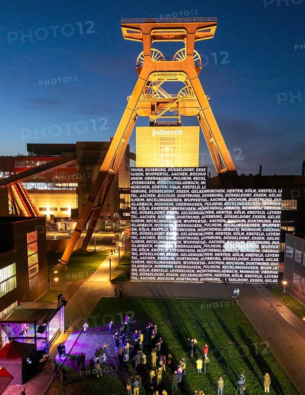 Advertising for participation in the referendum on the Olympic bid of North Rhine-Westphalia, with the Rhine-Ruhr region, Cologne-RheinRuhr, interactive light installations can now be seen at 5 different well-known sights, which are aimed at the citizens of the affected cities and regions to take part in the vote, here the Doppelbock conveyor framework of shaft 12, at the Zollverein colliery in Essen