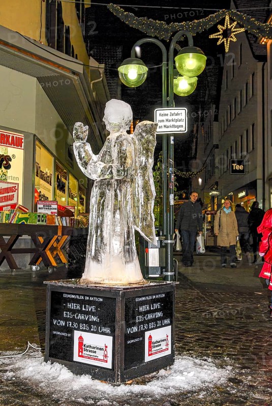 Eisengel, an ice sculpture created during Ice Carving Street Action as part of the long shopping night in downtown Reutlingen, Baden-Württemberg, Germany, for editorial use only