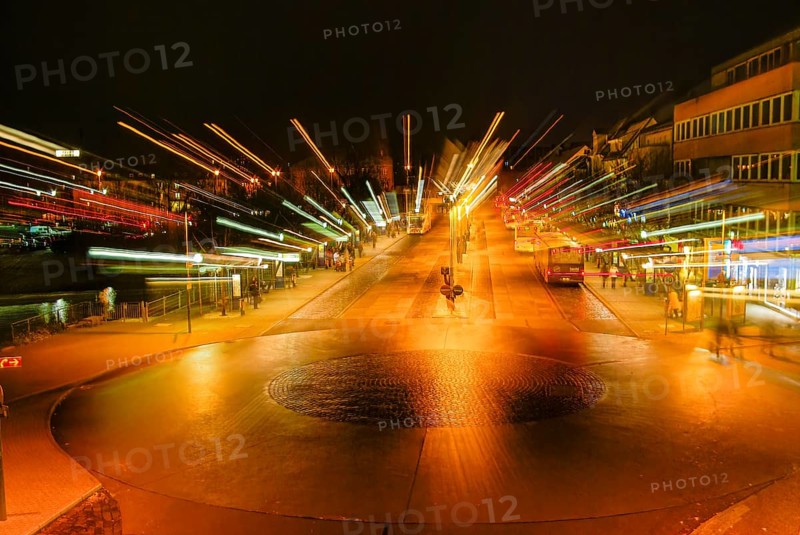 Nocturnal bus station with zoom effect, downtown Reutlingen, Baden-Württemberg, Germany
