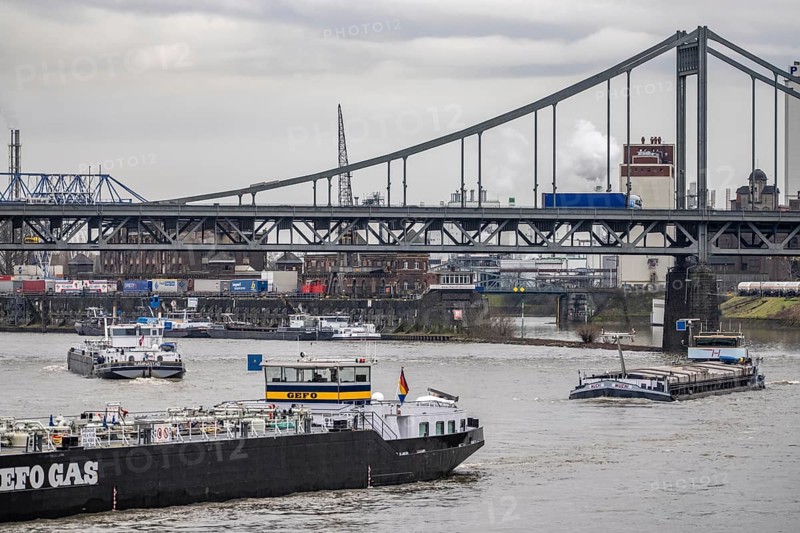 Cargo ships, Krefeld-Uerdinger bridge across the Rhine, near the Krefeld-Uerdingen Rhine port, North Rhine-Westphalia, Germany
