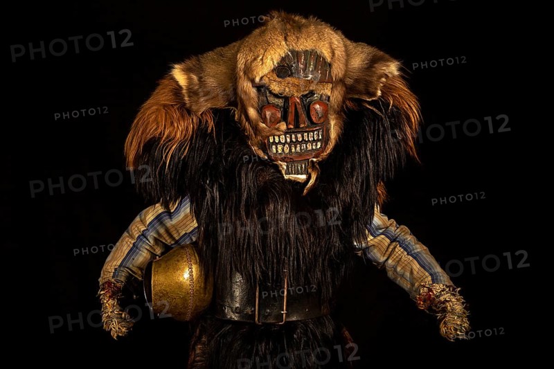 Portrait of traditional hand-carved wooden mask from the Loetschental Carnival, representing folkloric characters, spirits, and demons, Loetschental village, Valais Canton, Switzerland