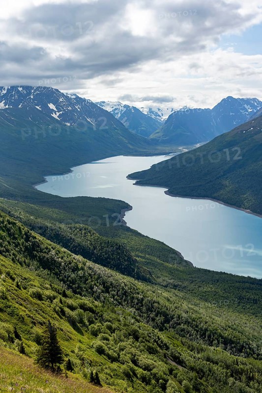 View of blue lake and mountains on Twin Peaks Trail, Eklutna Lake, Chugach Mountains, Chugach State Park, Alaska, USA