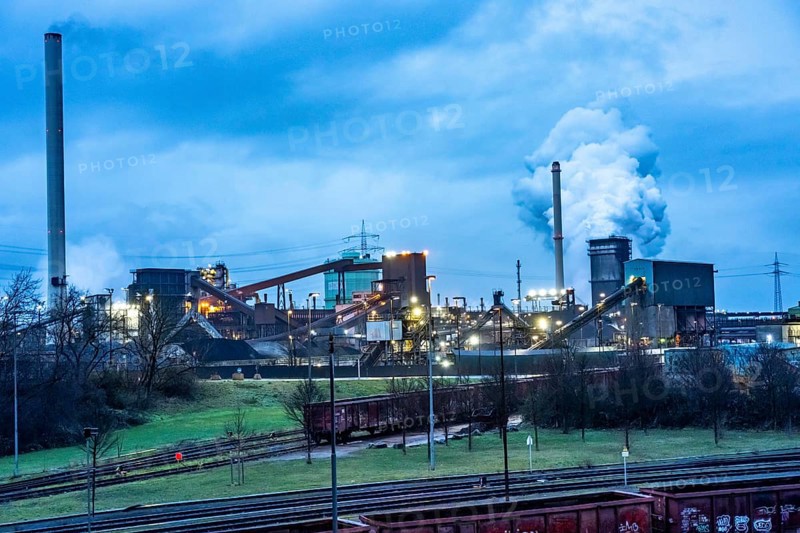 Hüttenwerke Krupp-Mannesmann, HKM in Duisburg, coking plant, fire tower with fire cloud, marshalling yard tracks, North Rhine-Westphalia, Germany