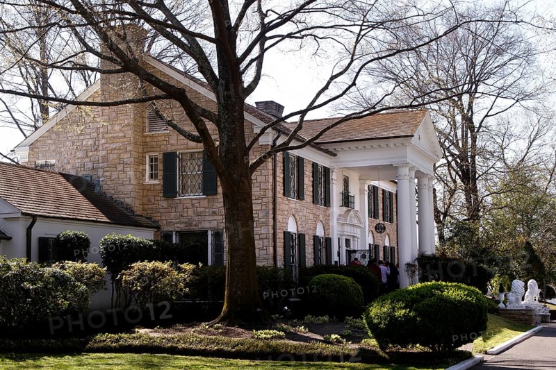 The famous Graceland estate surrounded by trees and well-kept gardens, Memphis, Tennessee, USA