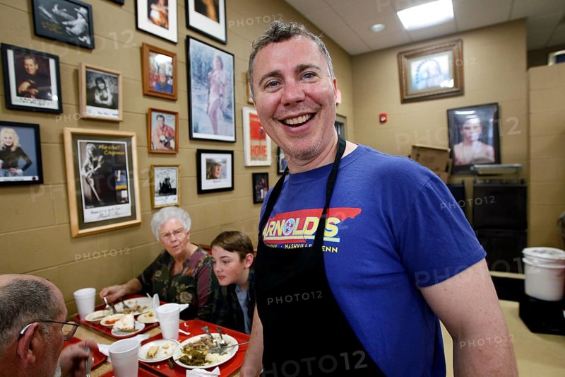 Friendly host laughs at Arnold's Country Kitchen in Nashville, Nashville, Tennessee, USA