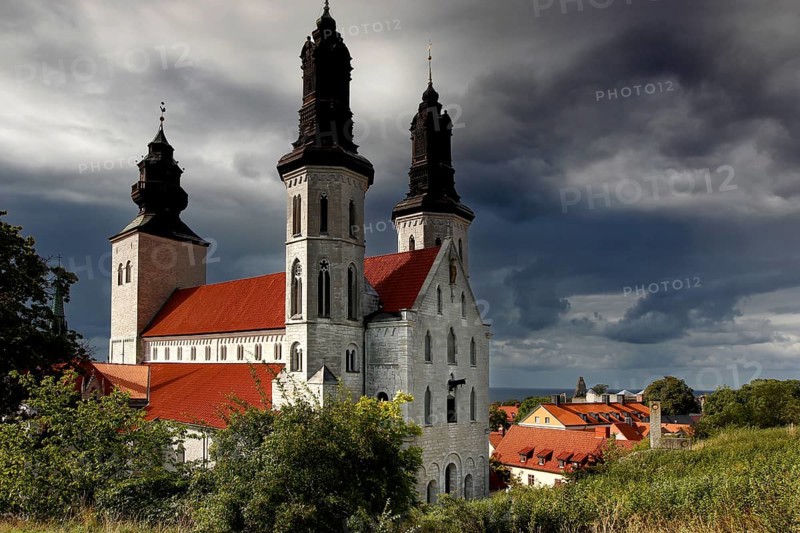 The distinctive cathedral rises under a dramatic sky in the old town, Visby, Gotland, Sweden