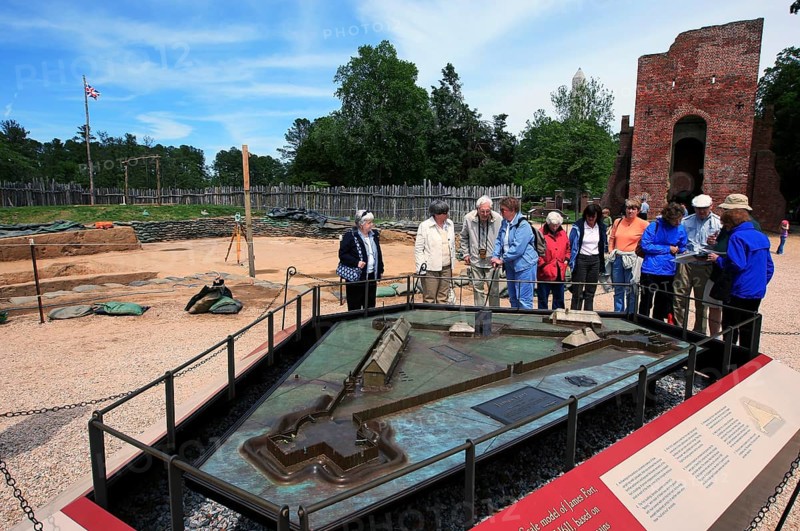 Visitors look at a model at Jamestown National Historic Site, Jamestown, Virginia, USA