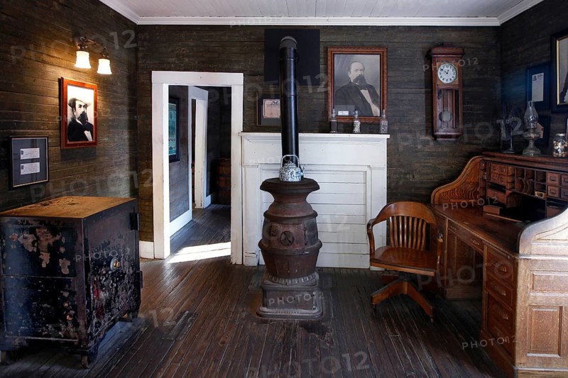 Office with antique furniture and a fireplace at Jack Daniel's Distillery, Lynchburg, Tennessee, USA