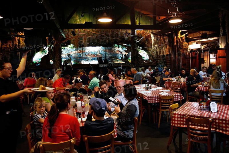 Lively Prejean's restaurant with guests having dinner in a relaxed atmosphere, Lafayette, Louisiana, USA