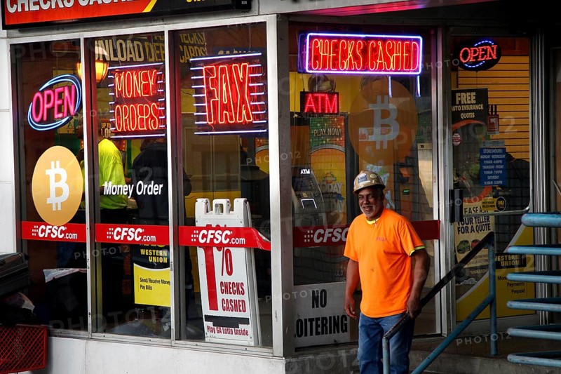 A store in downtown Atlanta illuminated with eye-catching neon signs and a Bitcoin presence, Atlanta, USA
