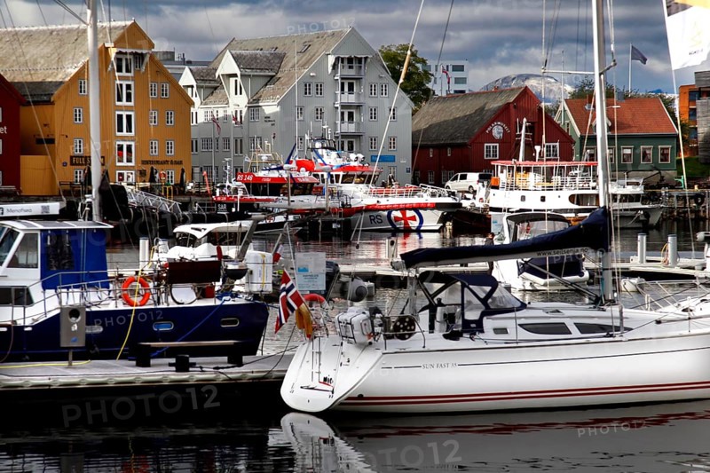 View of the marina in Tromsø city center with colorful buildings, Tromsø, Norway