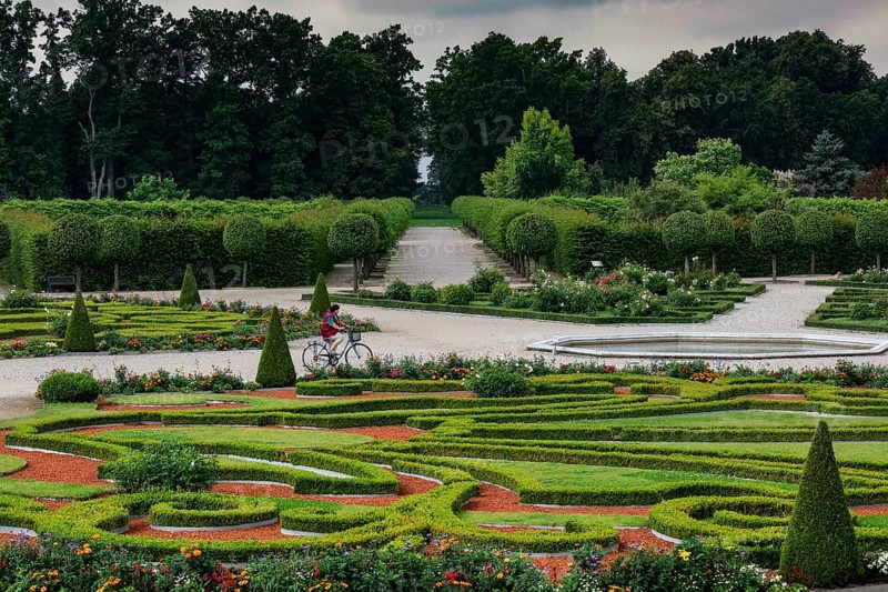 Magnificent baroque garden with symmetrical hedges and green backdrop, Rundale, Latvia