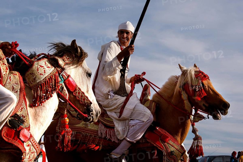 A rider performs a traditional Fantasia performance, El Kelâa m'Gouna, Morocco