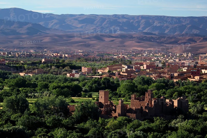 Panoramic view of the green Rose Valley with Kasbah and surrounding mountains, El Kelâa m'Gouna, Marrakesh-Safi, Morocco
