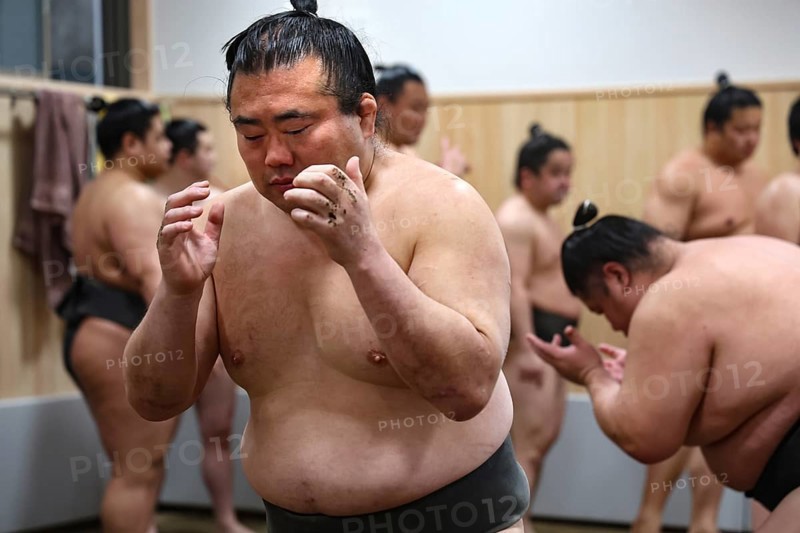 Sumo wrestler engaged in intensive training session at Sumo Center, Tokyo, Ryogoku, Japan