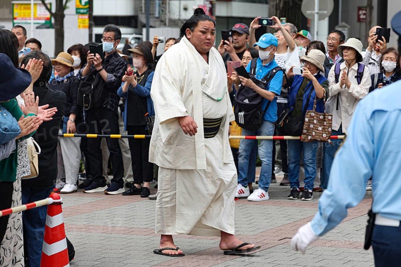 A sumo wrestler in traditional clothing at a public appearance in Tokyo, Tokyo, Ryogoku, Japan