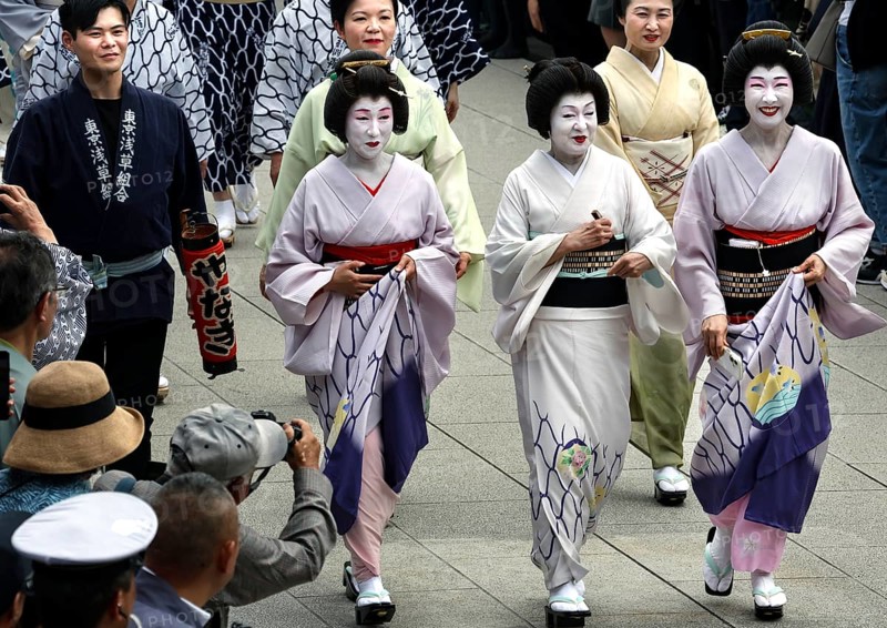 Geishas in traditional dress at the Daigyoretsu Parade at Senso-ji in Tokyo, Tokyo, Japan