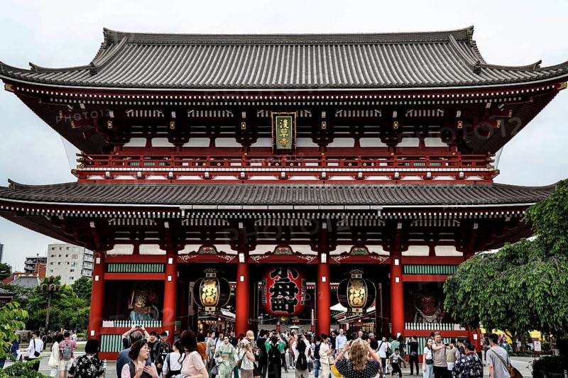 Entrance gate of Senso-ji Temple with crowd, traditional Japanese design, Tokyo, Japan