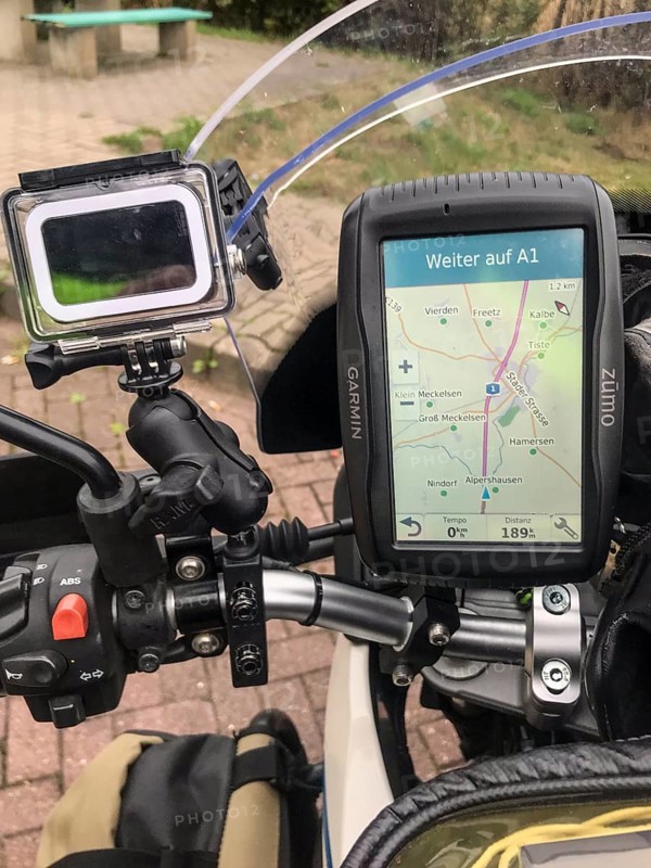 Hatzte, Elsdorf, Lower Saxony, Germany, close-up of a GPS device on a BMW G 650 GS Sertao enduro motorcycle with a road map for navigation