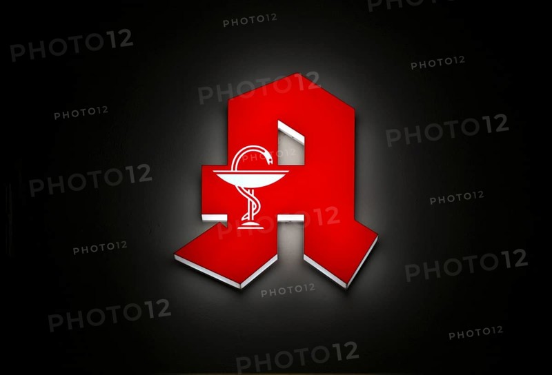 Night shot, logo, red neon sign, pharmacy sign with Aesculapian stick, Aesculapian stick, Stuttgart, Baden-Württemberg, Germany