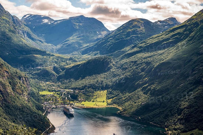 Geiranger, Møre og Romsdal province, Norway, low-lying valley at Geirangerfjord and a ship in the countryside