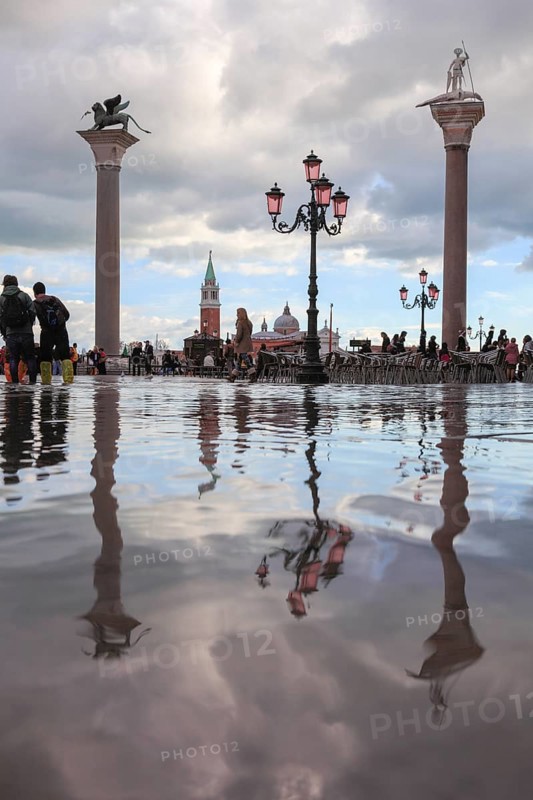The pillars of Piazzetta, St. Mark and St. Theodorus, at high tide, Acqua Alta, San Marco, Venice, Veneto, Italy