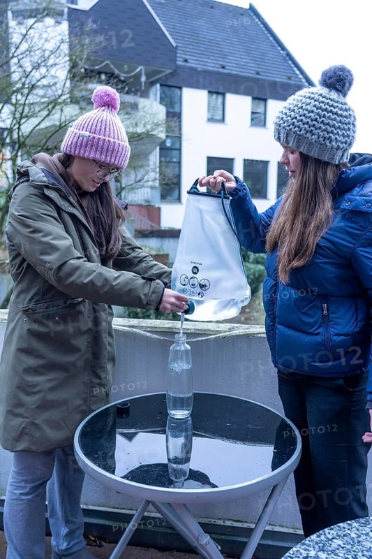 Symbolic picture blackout, extensive, prolonged power failure, in the private environment, without electricity, the water supply also fails, rainwater is made drinkable with the help of a water filter
