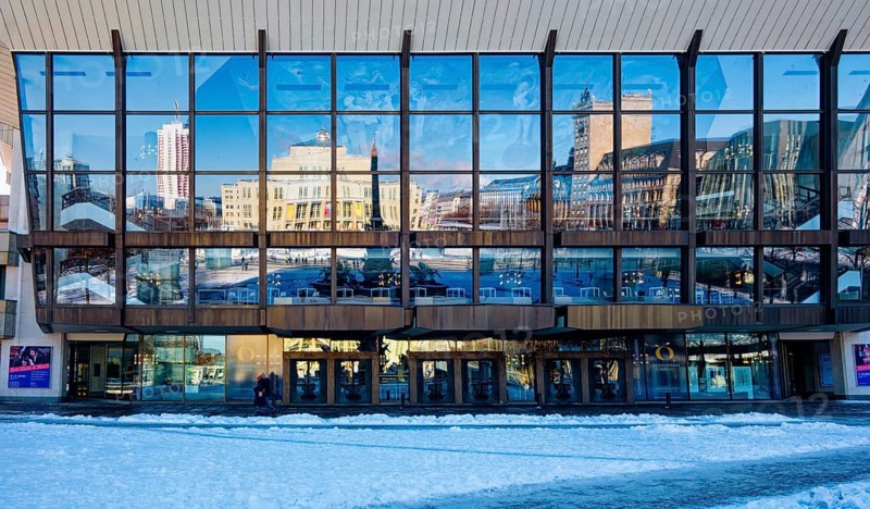 Gewandhaus façade with reflection of Augustusplatz in winter with snow, Leipzig, Saxony, Germany