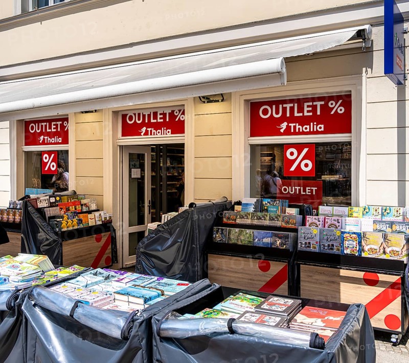Sales stands in front of a Thalia bookstore in downtown Potsdam, Brandenburg, Germany