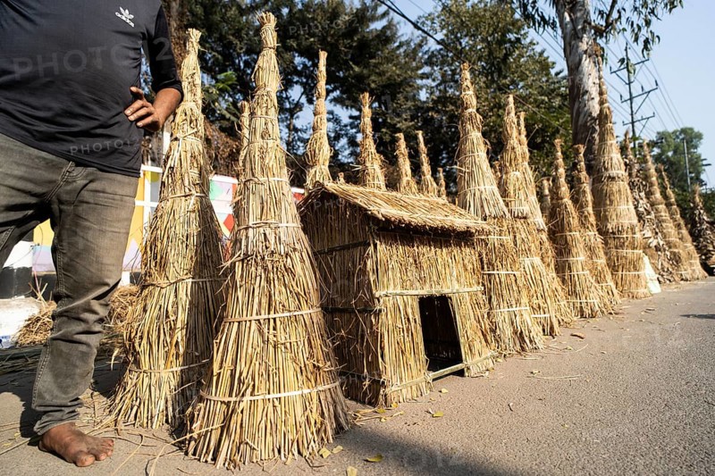 Vendor selling Meji (Bonfite), as part of preparations ahead of the 'Magh Bihu' festival, in Guwahati, Assam, India on January 12, 2026. Magh Bihu, also called Bhogali Bihu, is Assam's harvest festival marking the end of the agricultural season and celebrated with feasts, community bonfires, and traditional food