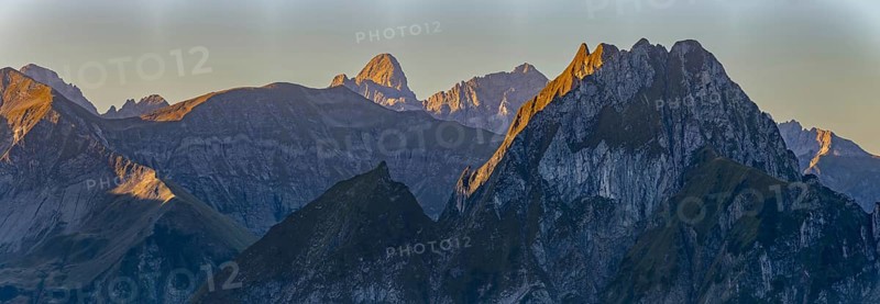 Mountain panorama at sunrise from Nebelhorn, 2224 m, to Höfats 2259 m, behind it the Große Krottenkopf illuminated by the morning sun, 2656m Allgäu Alps, Allgäu, Bavaria, Germany