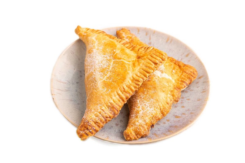 Triangles Pie, Puff Pastry, Samsa with cherry jam isolated on white background, side view, close up