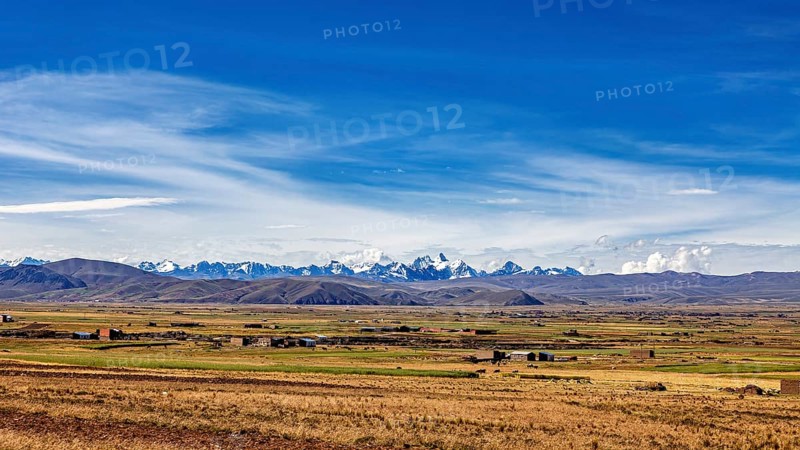Wide landscape with mountains on the horizon and clear sky, The landscape of the Altiplano in the Andes of Bolivia