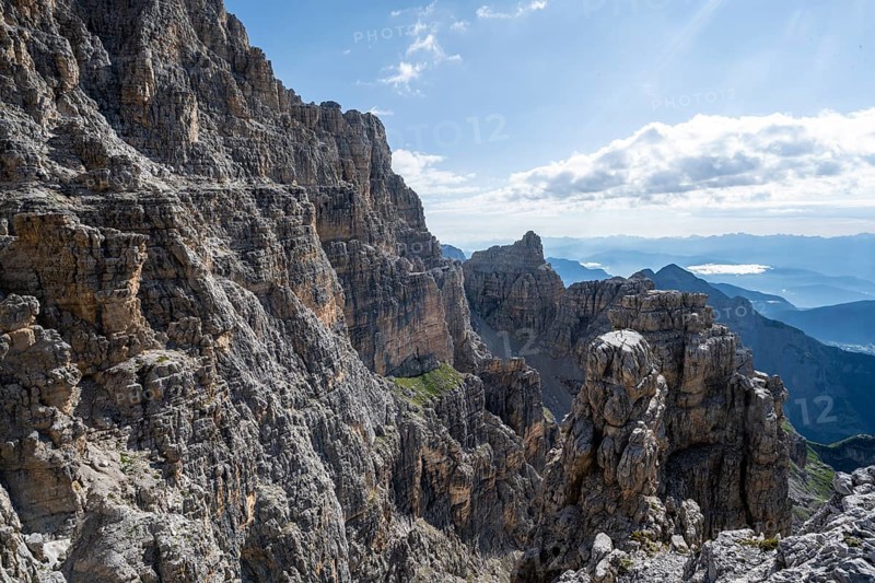Spectacular mountain landscape with steep cliffs and rock towers, Via Ferrata Bocciere Centrale via ferrata, Brenta Mountains, Parco Naturale Brenta-Adamello, Trentino, Italy