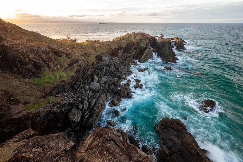 Sunset with wide view over the east coast at Cape Byron, New South Wales, Australia