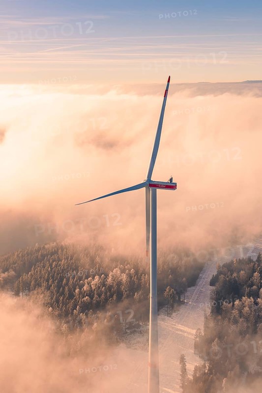 Single wind turbine rises over foggy landscape with low sun, Bad Wildbad, Calw district, Black Forest, Germany