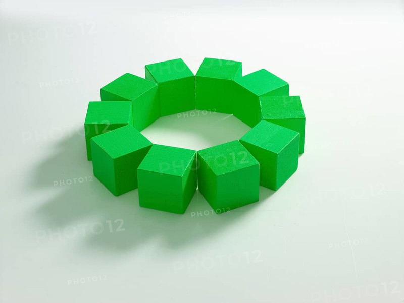 10 green wooden cubes against a white background