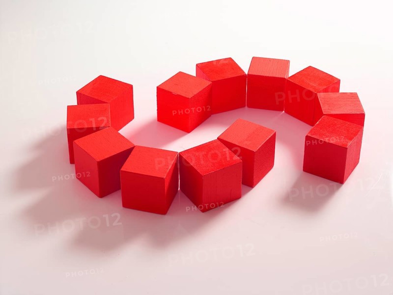 12 red wooden cubes against a white background