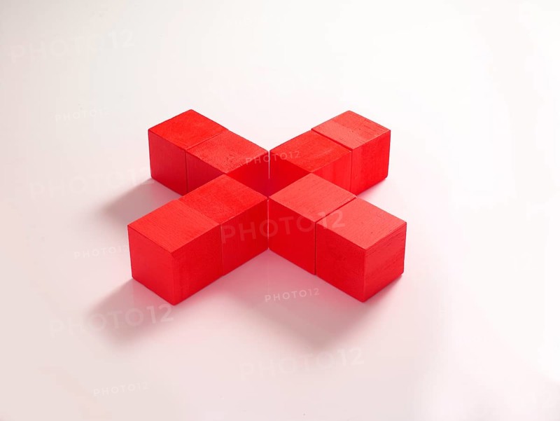 8 red wooden cubes against a white background