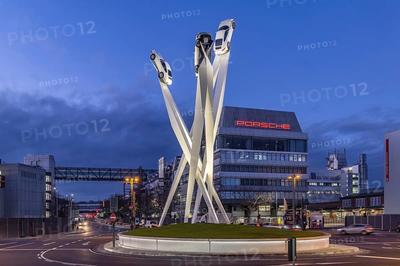 Inspiration 911 artwork by Gerry Judah in front of the Porsche headquarters on Porscheplatz: three steles, each presenting a Porsche 911 at a height of up to 24 meters. Stuttgart, Baden-Württemberg, Germany