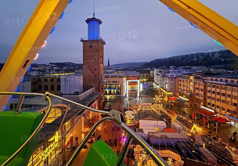 View of the town hall tower with the Christmas market from a Ferris wheel gondola, Hagen, Ruhr area, North Rhine-Westphalia, Germany