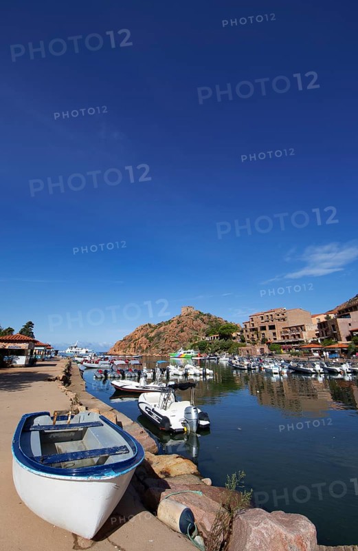 Boats in Port de Porto or Port of Porto on the Porto River, behind the Genoese Tower, Porto, Ota, west coast of Corsica, Corse-du-Sud, Corsica, France